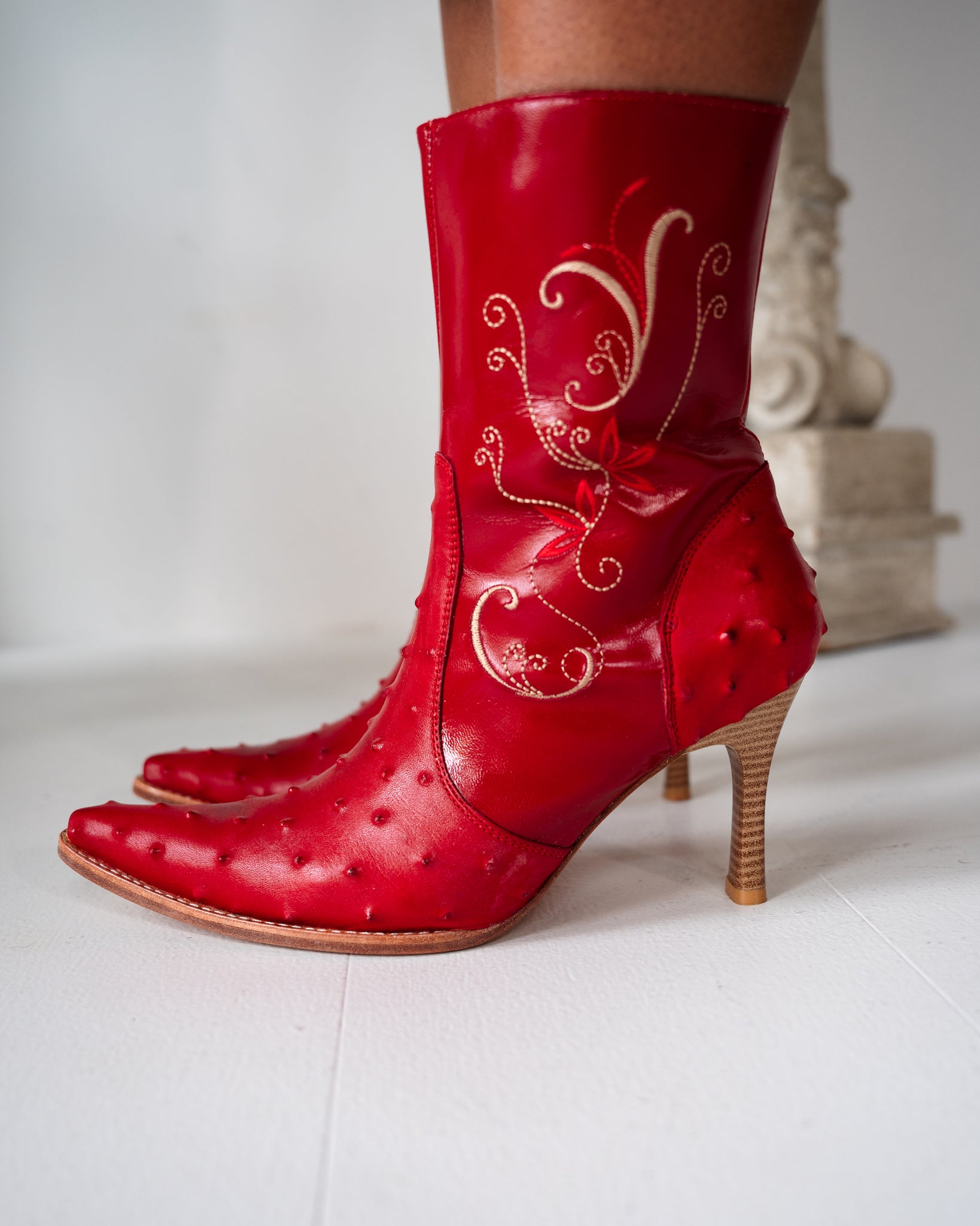 RED TEXTURED AND EMBROIDERED COWBOY HEELS